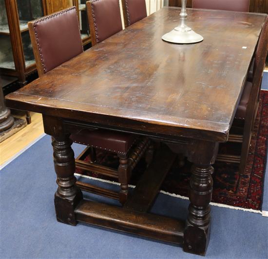 A 17th century style oak refectory table, 230cm